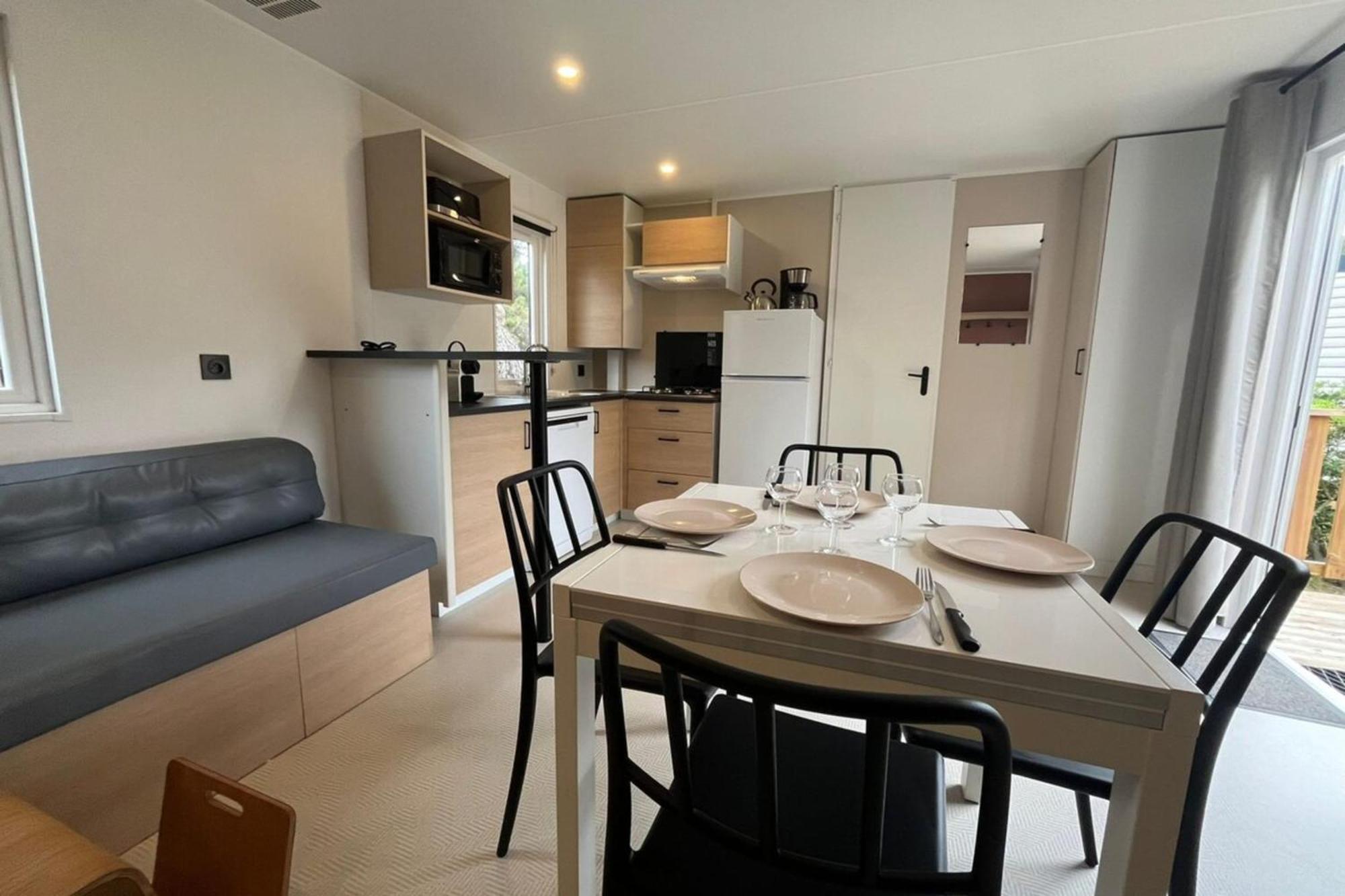 Holiday home Mobil Dans Un 4 En Bord De *